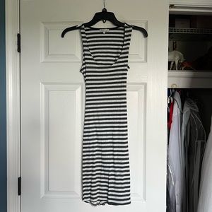 Gray striped mini dress. Bodycon style with a cutout back.